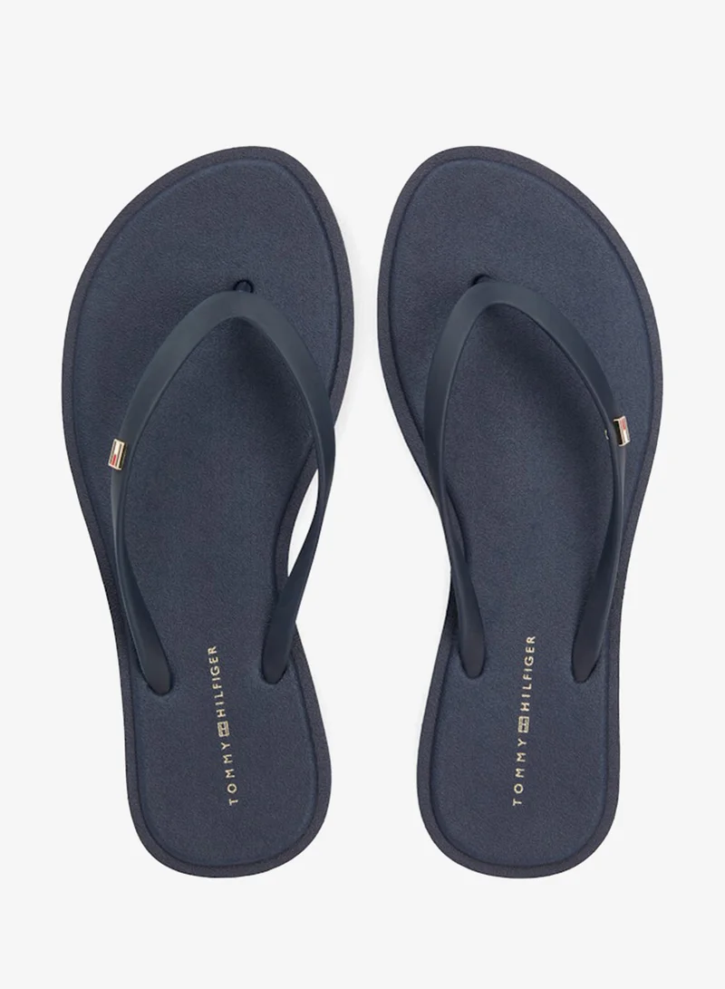 TOMMY HILFIGER  Chic Enamel Flag Flip-Flops for Women | Best Price UAE